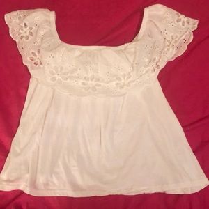 White off or on the shoulder summer blouse.